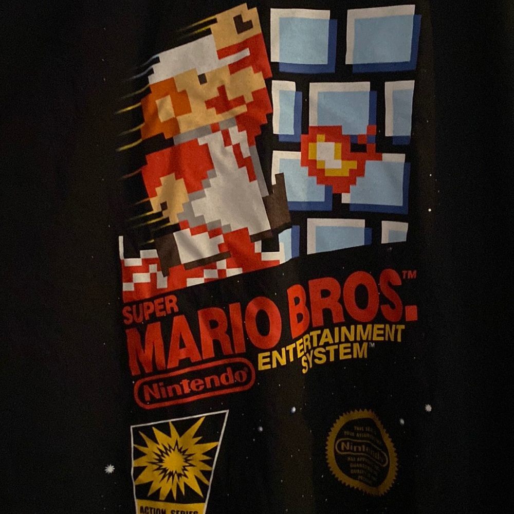 Nintendo entertainment system Super Mario bros. Classic retro logo Mario jumping